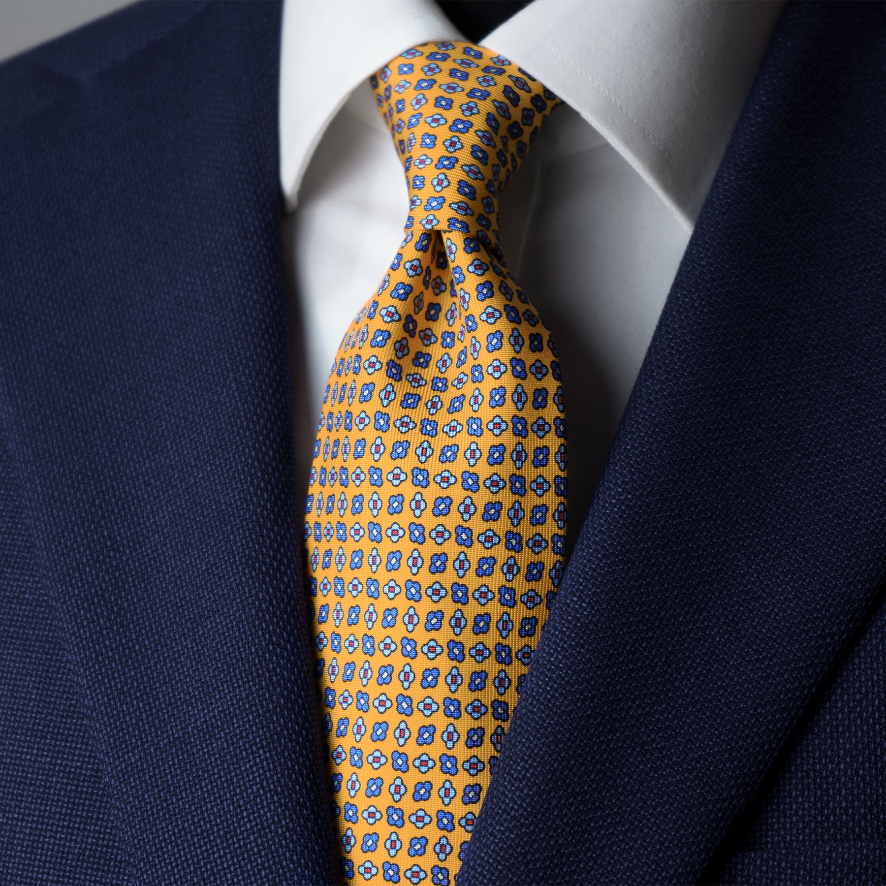 Burnt Yellow & Blue Floral Repeat Silk Tie Rampley and Co Burnt Yellow & Blue Floral Repeat Silk Tie Rampley and Co